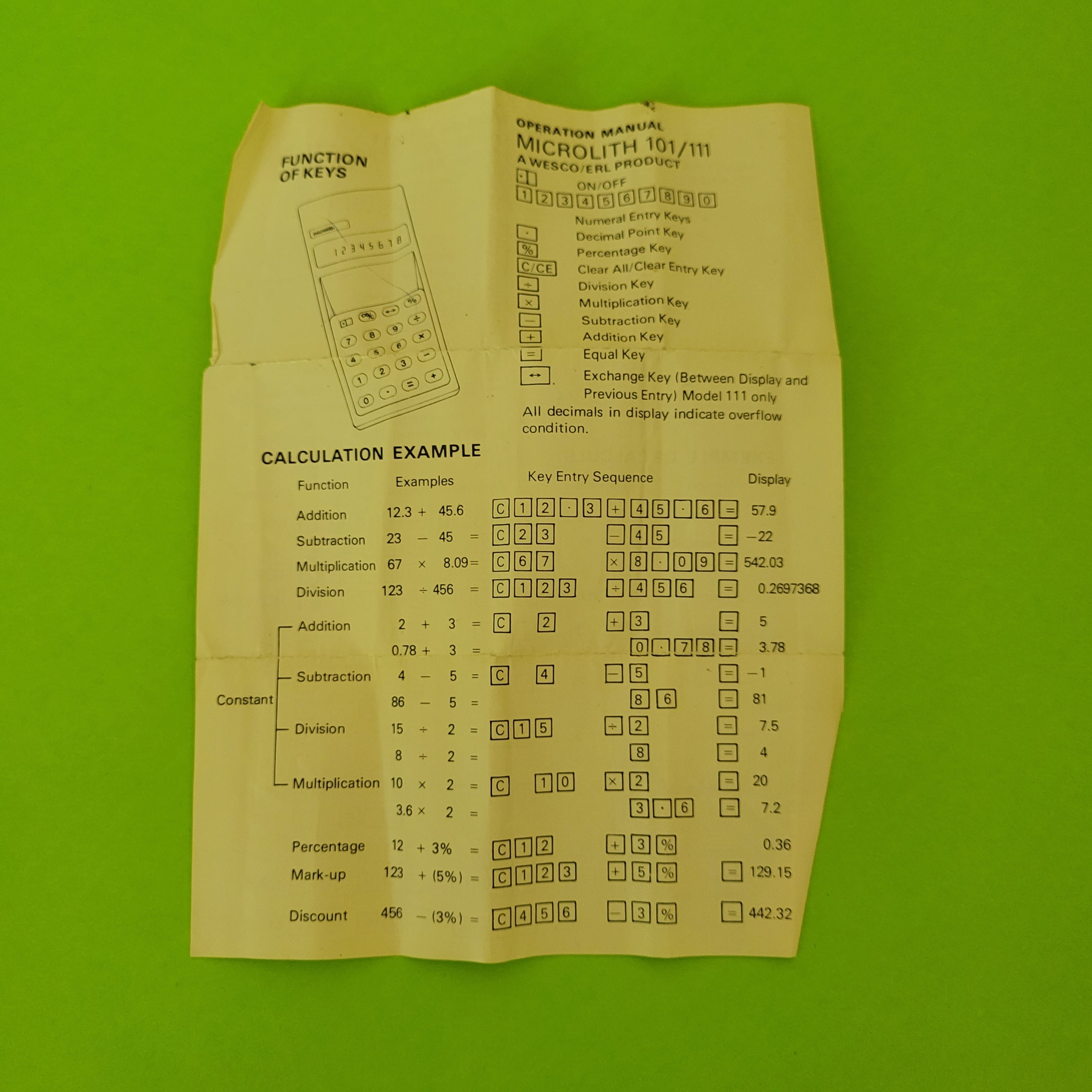 An image of the manuel of a Microlith Four function plus calculator